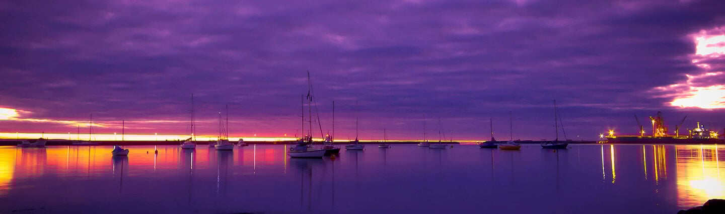 Boats on the sea at sunset