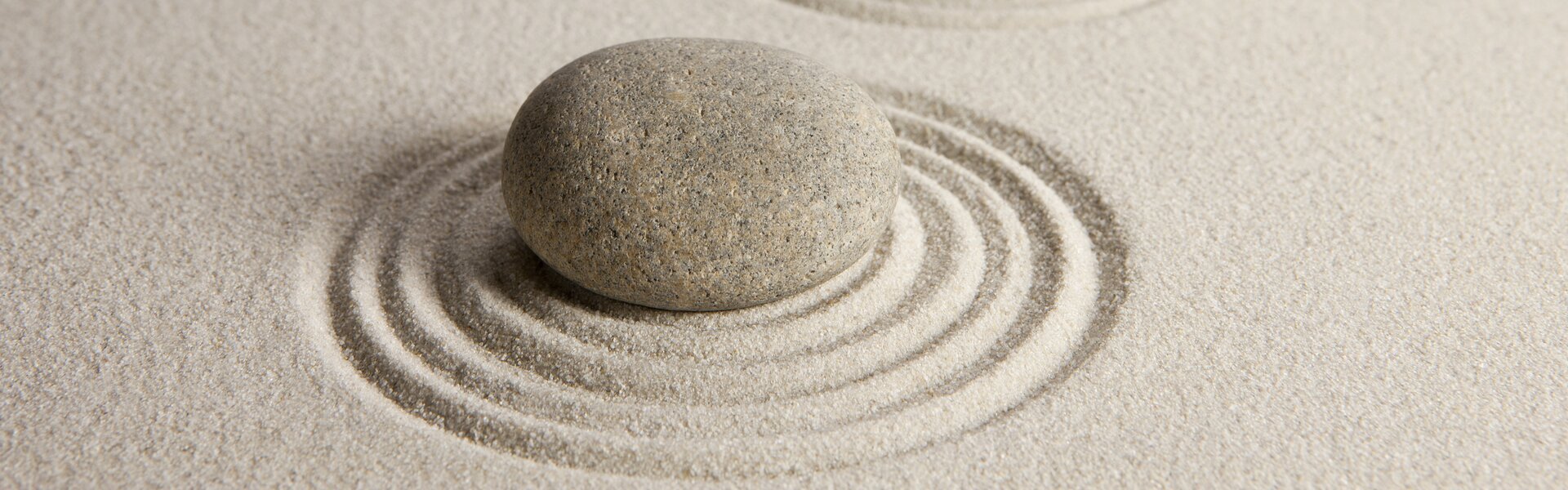 Rock placed on a sand