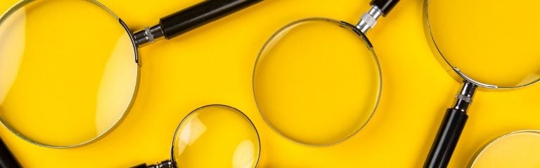 Magnifiers on a yellow background