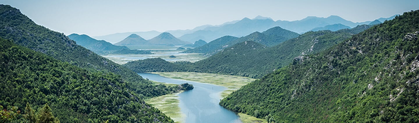 River winding through green hills