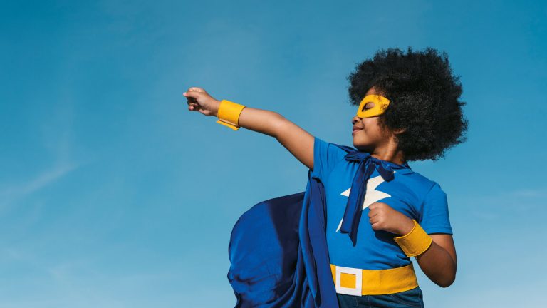 Boy in a superhero costume