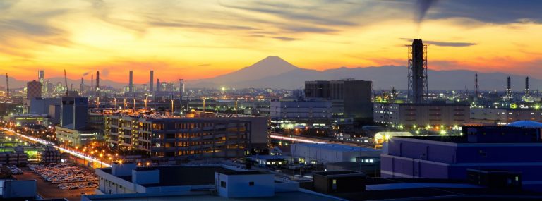 Sunset over the city and factories