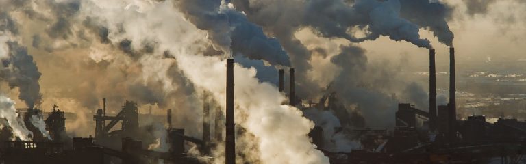 Clouds of smoke from the chimneys of factories