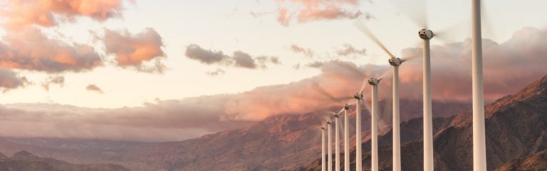 Windmills on the background of mountains