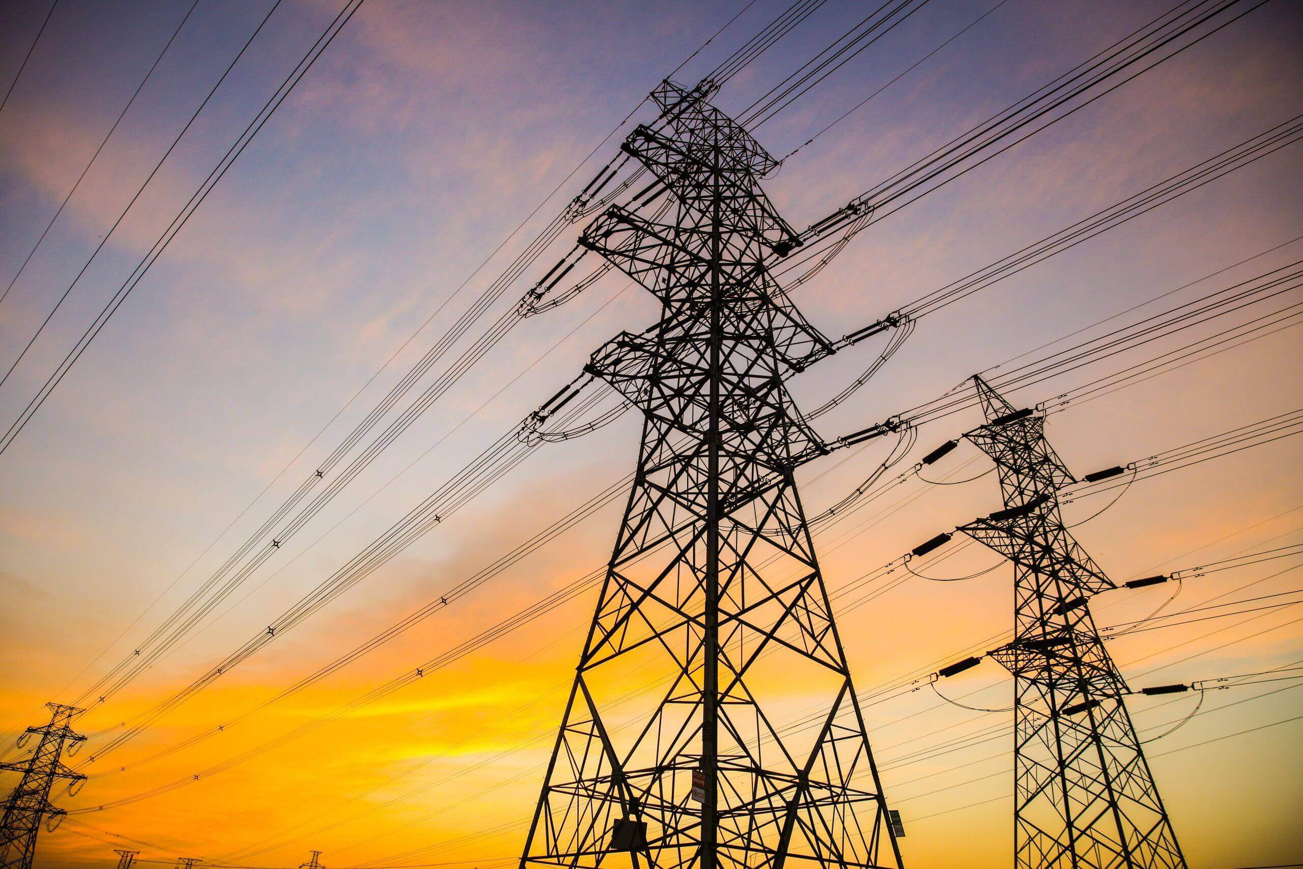 Electric power lines at sunset