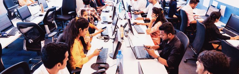 Office employees making phone calls