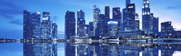 View of a modern city on the river at night