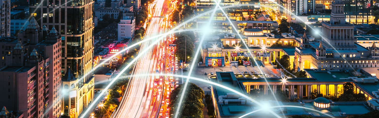 Image showing curved beams of light over city of Shanghai at night