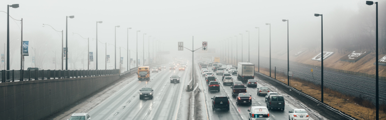 fog covering a busy road
