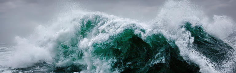 raging sea with stormy backdrop