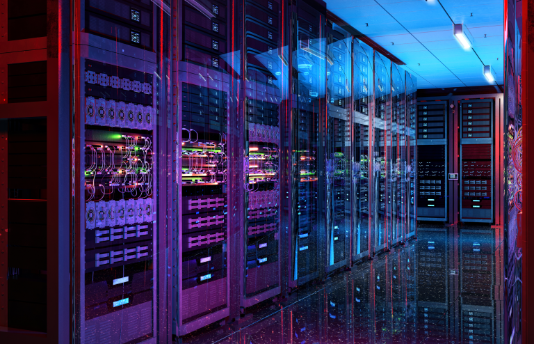 a row of server banks lit up by purple and blue lighting
