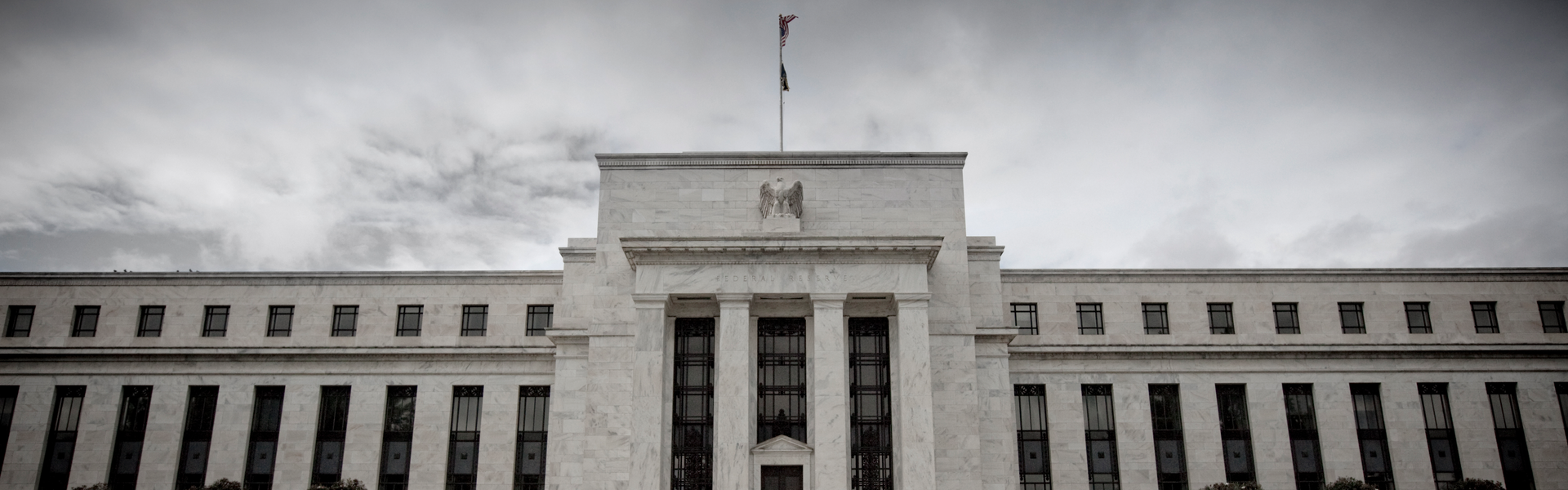 Storm clouds over US Federal Reserve building