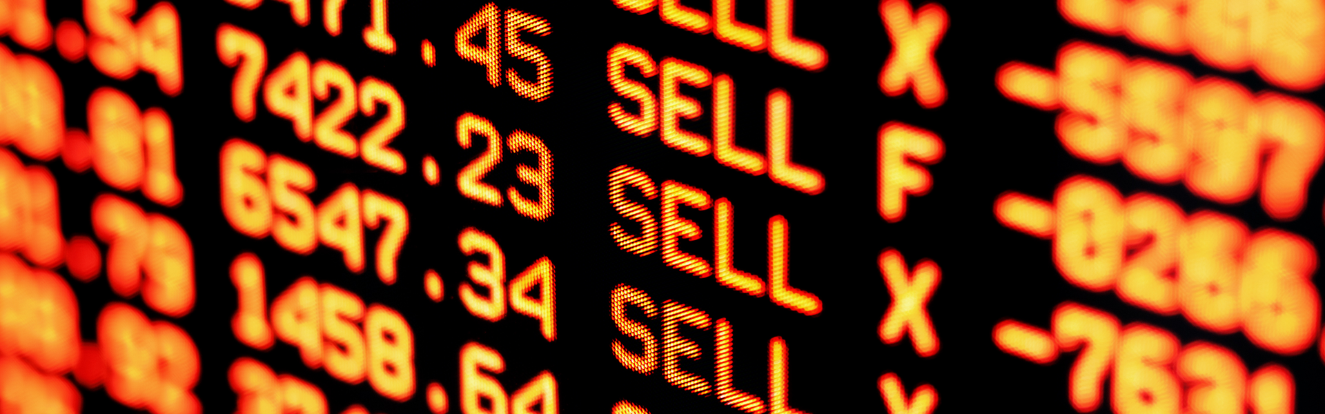 Flashing 'sell' signs on a bourse screen