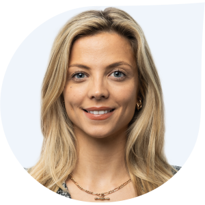 A corporate photograph in droplet shape with grey background of Jessica Henry