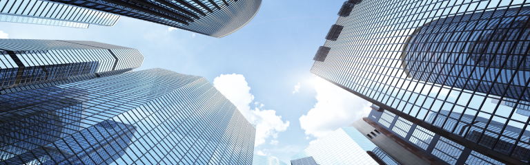 a view of skyscrapers taken from below