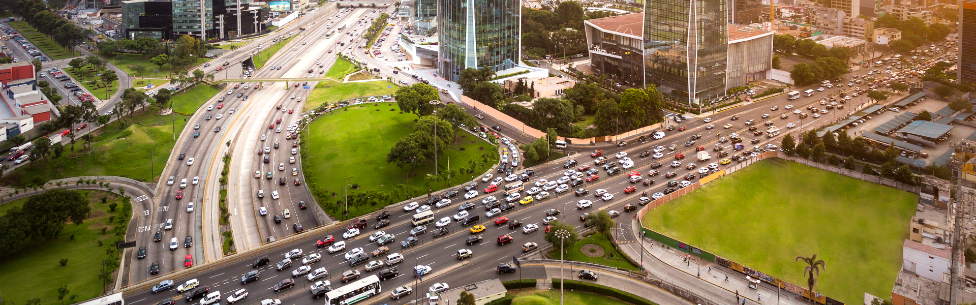 cars and roads and crossroads with skycrapers,